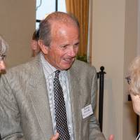 Norman Christopher with two guests.